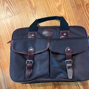 Filson briefcase or Shoulder bag. Brown leather trim. 17 x 13 x 5. Like new